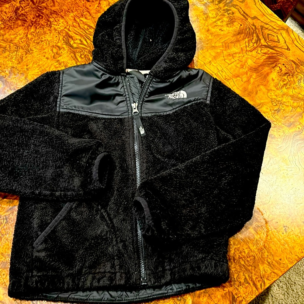 North face, hooded, zippered fleece jacket.